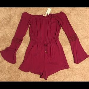 🎁 “NWT” Plum Long Sleeve Romper